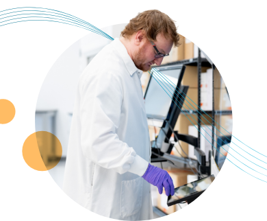 Gray background with parallel blue lines weaving through circle containing a photo of an ACCENTuator in the lab. Two small orange circles surround the main photo.